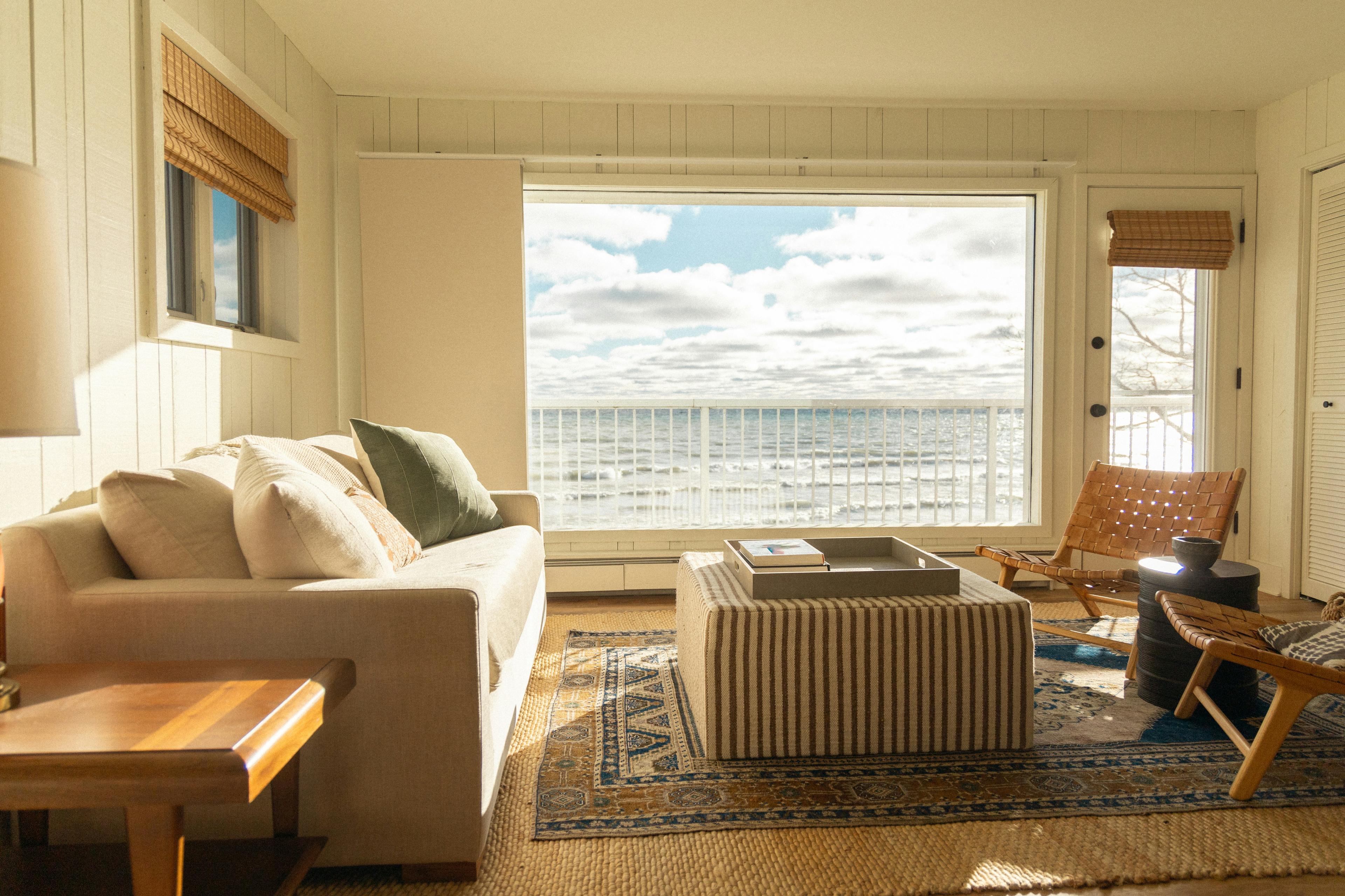 Coastal living room with a large picture window facing the ocean